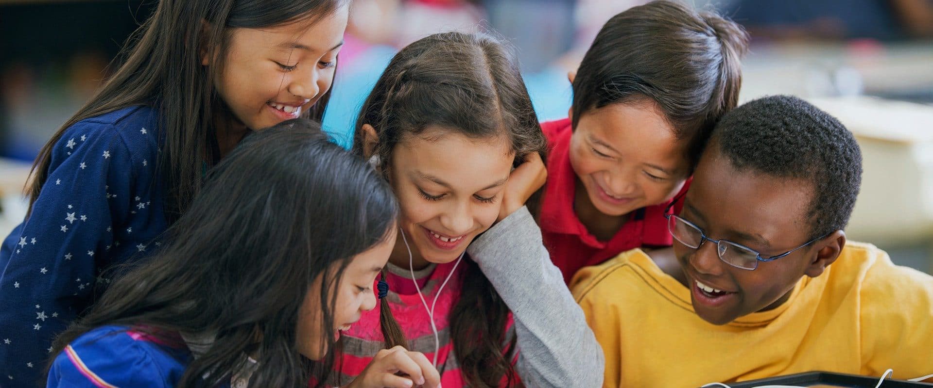 Children laughing together at The Village Learning Center